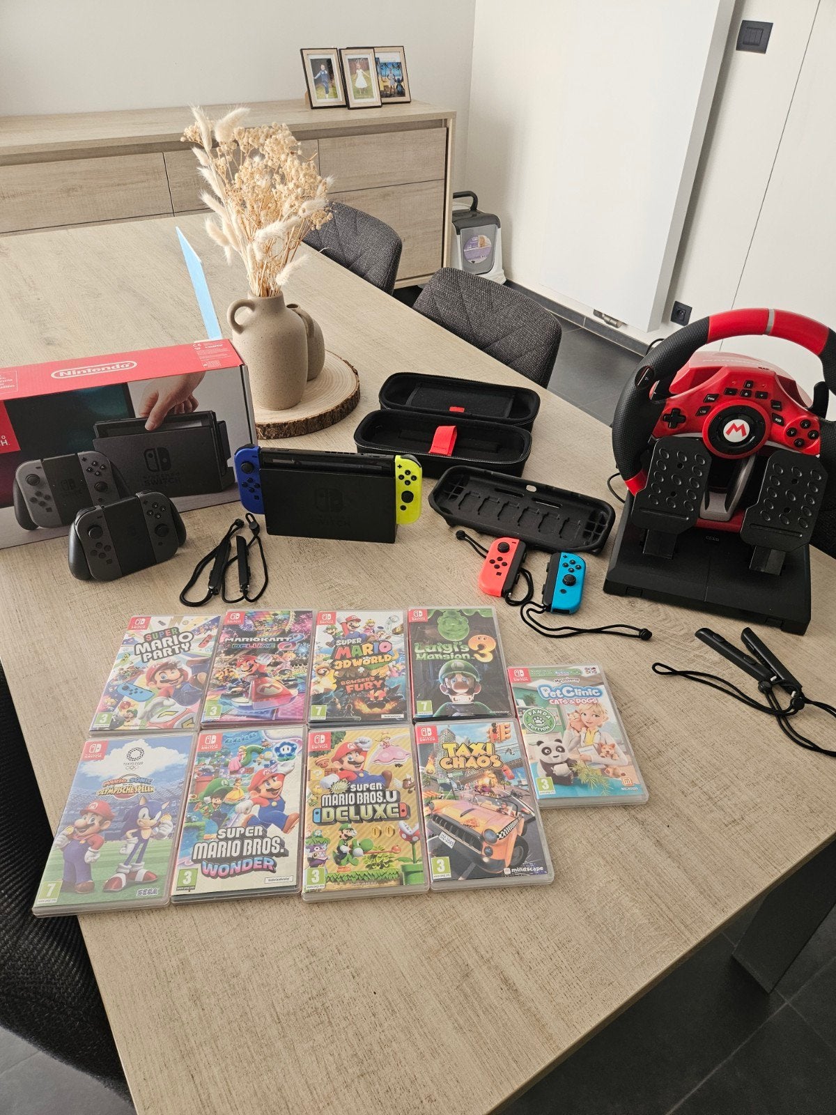 nintendo switch + 9games/racing stuur/extra controllers..., Ophalen, Zo goed als nieuw, Met 3 controllers of meer, Met games