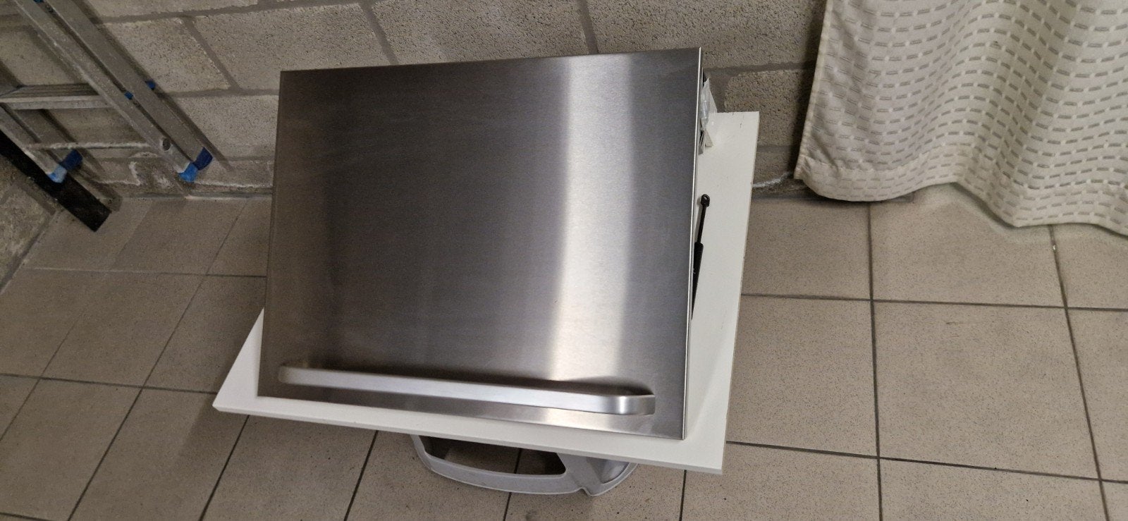 Liftdeur keukenkast, Ophalen