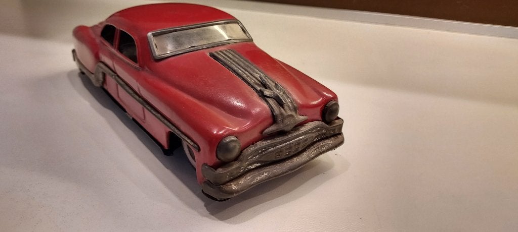 uitverkoop oude speelgoedauto Pontiac rood, nu 14 euro, Envoi