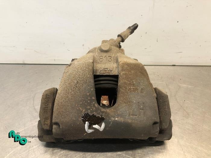 Etrier de frein (pince) avant gauche d'un Volvo V40 (V40 12-, -, 3 mois de garantie, -, -