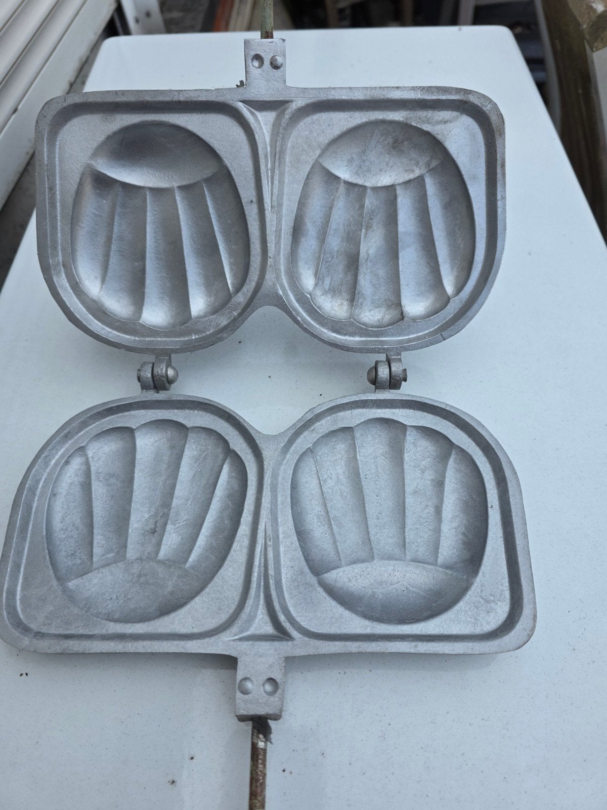 croque monsieur toestel voor kampvuur, Ophalen