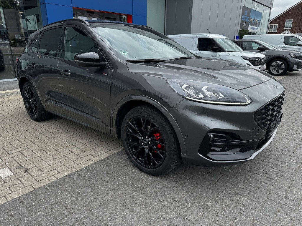 Ford Kuga ST Line X PHEV 2.5i 225PK Magnetic / Black Pack in, Auto's, Gebruikt, Zwart, Bedrijf, 5 zetels