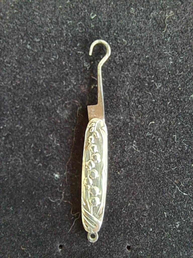 Antieke miniatuur zilveren veter trekker, Ophalen of Verzenden, Zilver