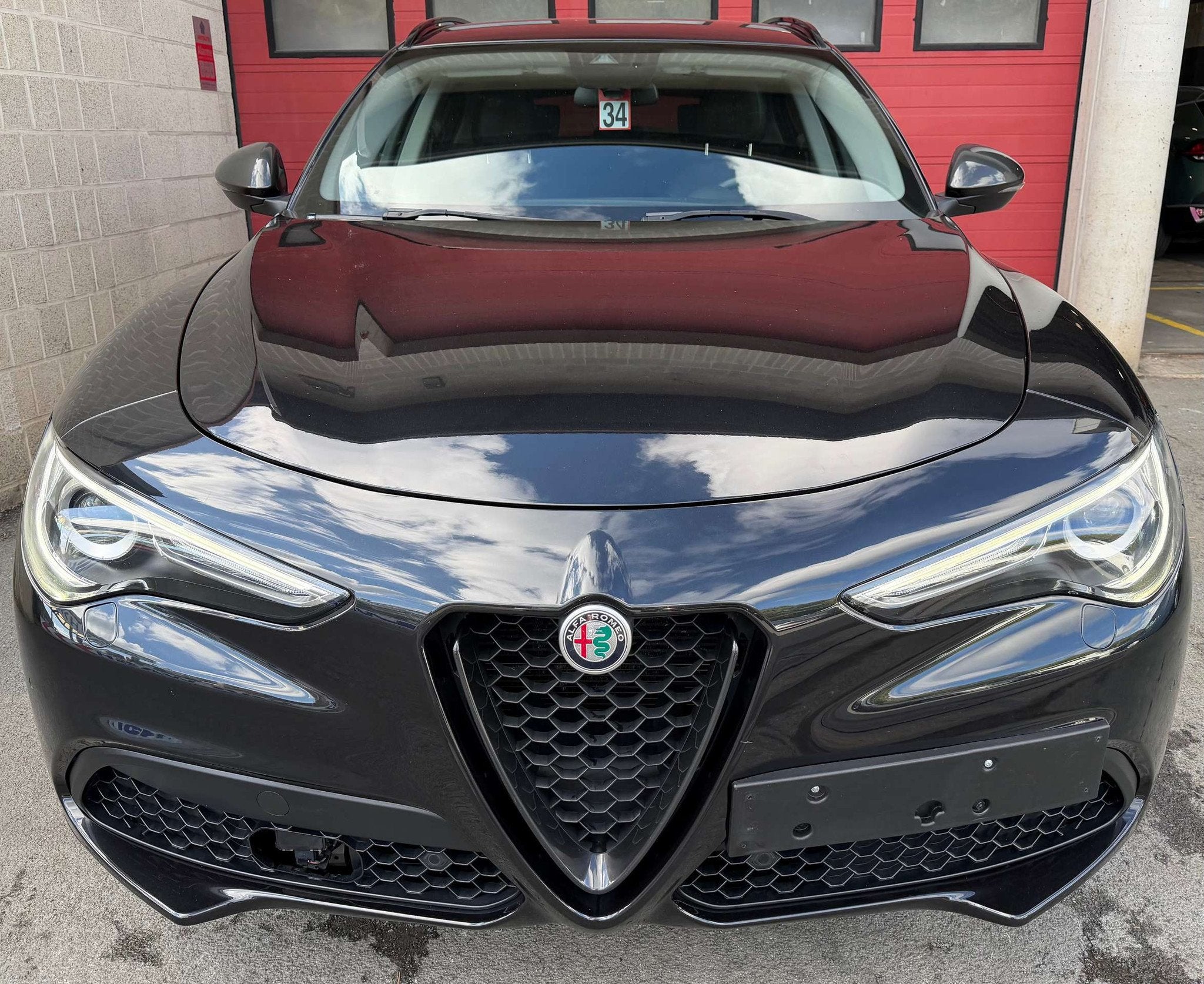 Alfa Romeo Stelvio 2.0 T AWD Sport + CAMÉRA + NAVI + CUIR, Automaat, 4 cilinders, Zwart, Leder