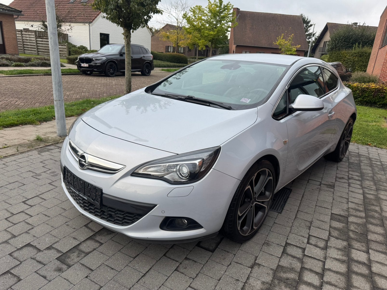Opel Astra GTC 1.4 benzine, Auto's, Voorwielaandrijving, Zwart, Leder en Stof, Bedrijf