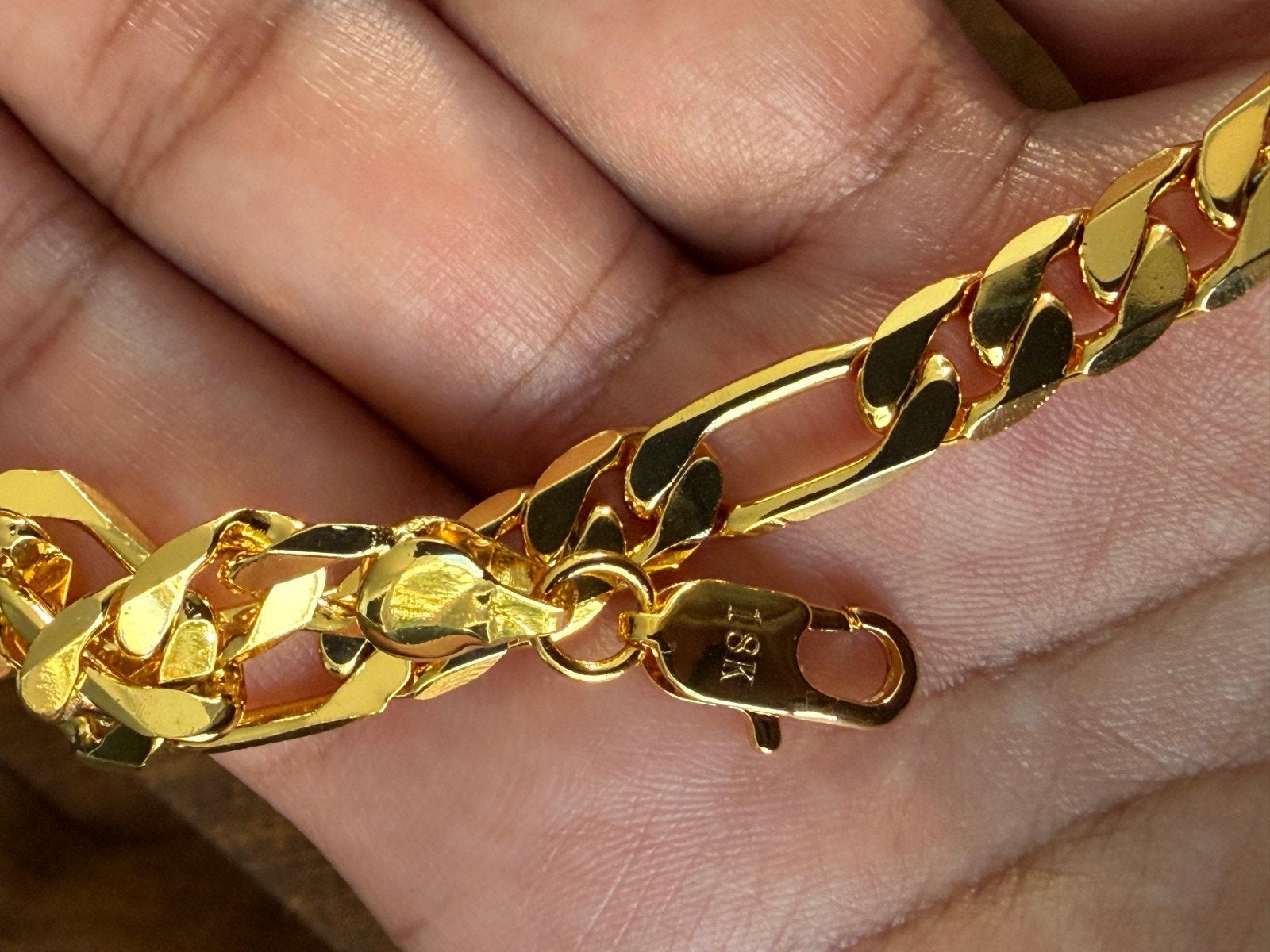 18k gold plated bracelet New never wear, Handtassen en Accessoires, Ophalen of Verzenden, Nieuw, Goud, Overige materialen