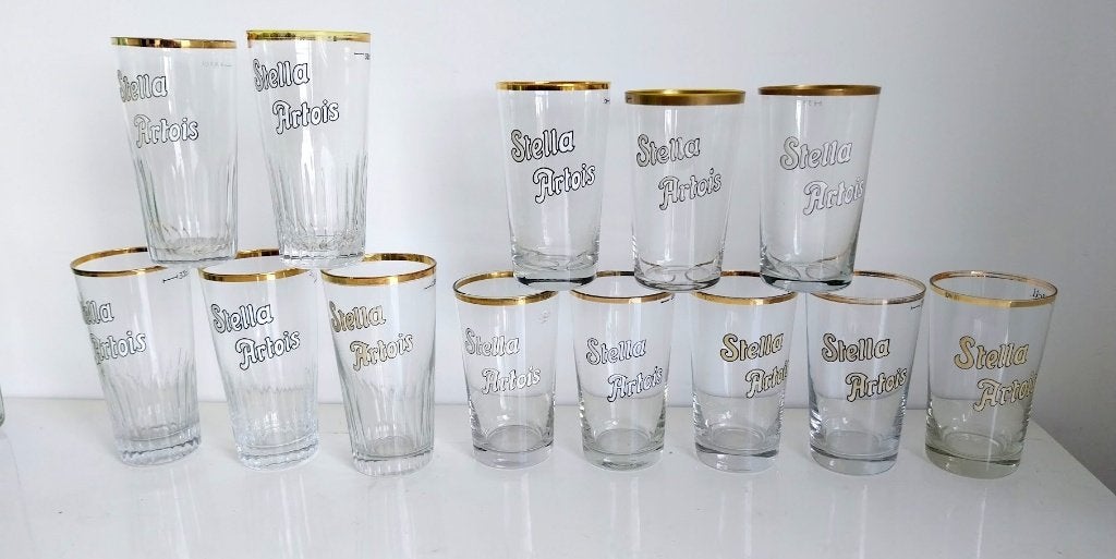 13 verschillende geëmailleerde glazen van Stella Artois, Verzamelen, Ophalen of Verzenden, Stella Artois