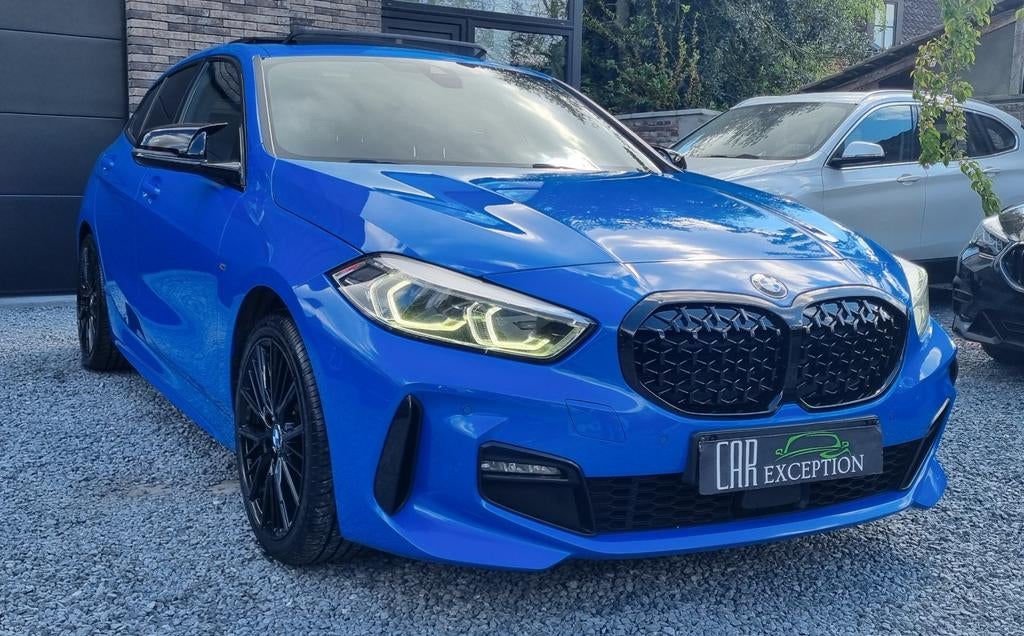 BMW 118i M‑Sport — Volledige opties — 1.5 Benzine 136 pk — 2, 1 Reeks, Parkeerassistent, Blauw, Leder en Stof