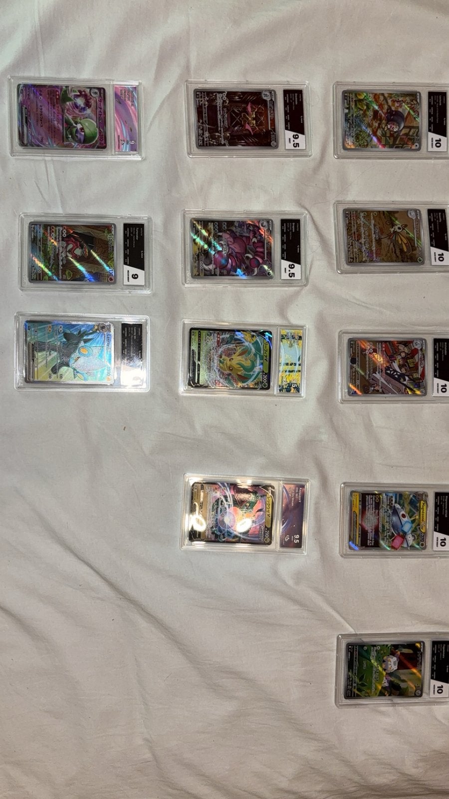 12 graded cards, Hobby en Vrije tijd, Foil, Ophalen of Verzenden, Nieuw, Losse kaart