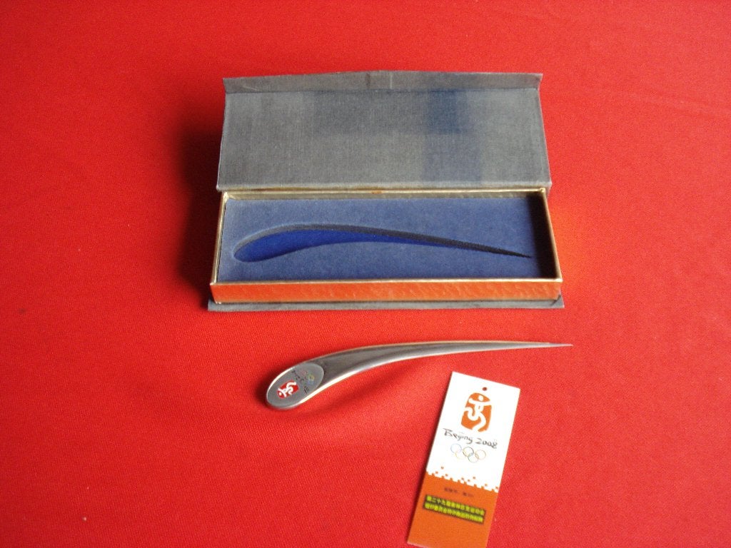 Briefopener Olymp. Spelen Peking 2008, Ophalen