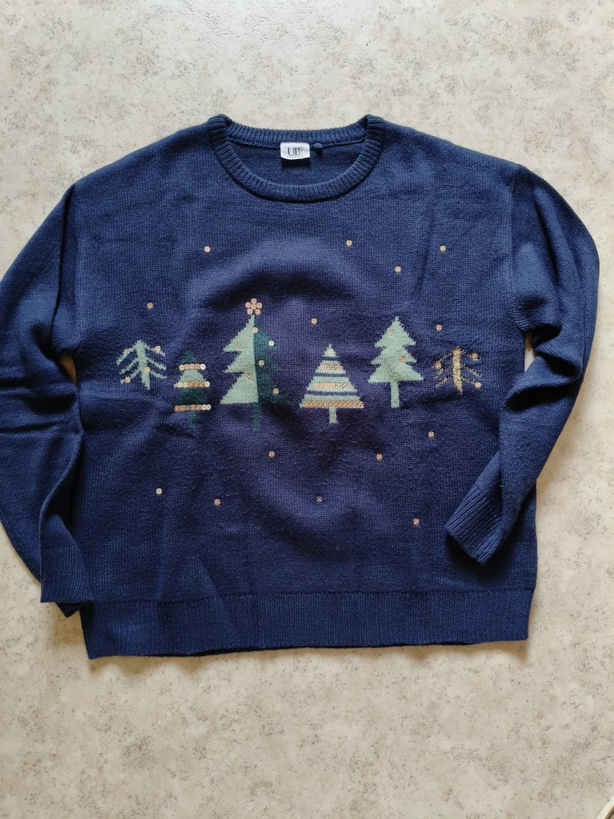 pull de Noël grand, Enlèvement