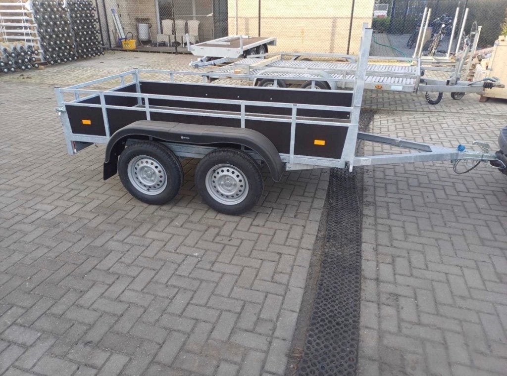 Nieuwe Syma dubbelas aanhangwagen 257 x 131 cm, Ophalen, Nieuw