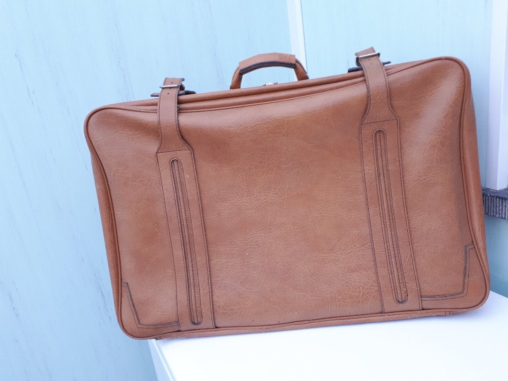valies koffer camel kleur, Ophalen