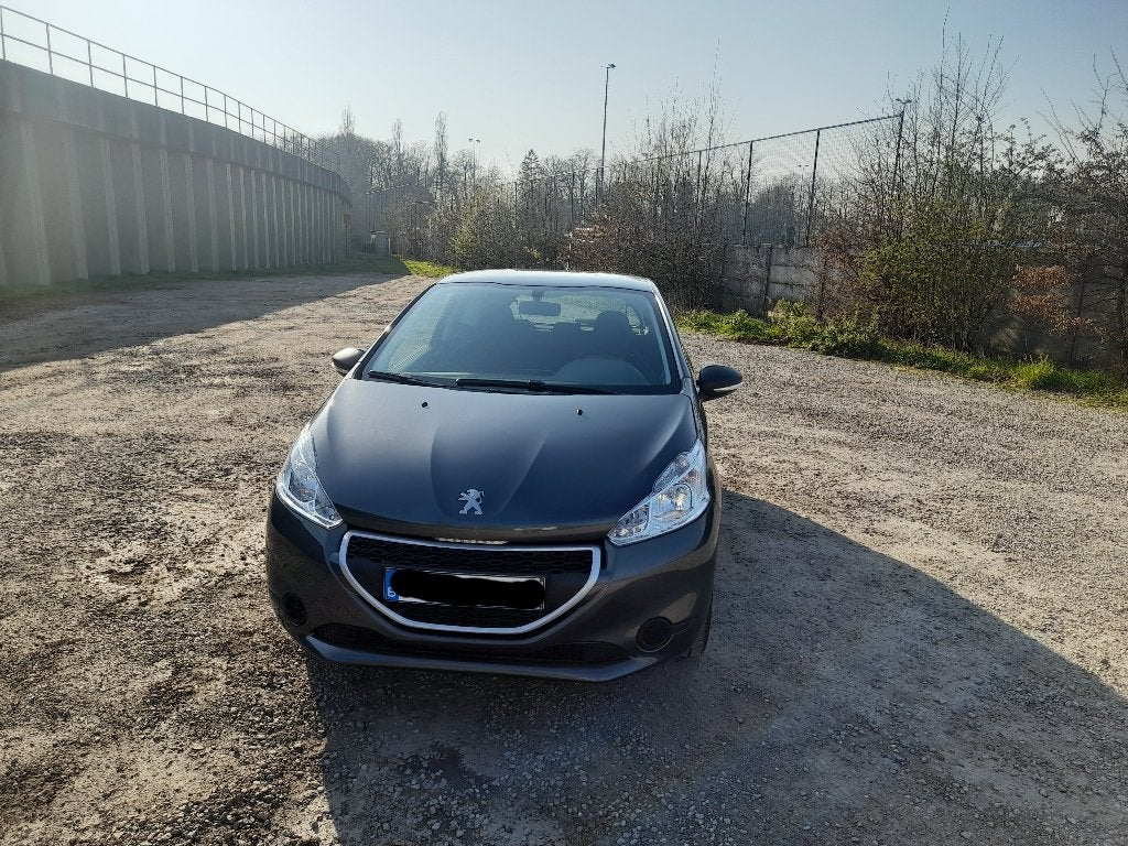 Peugeot 208 1.0 benzine Bouwjaar 2013 Gekeurd voor verkoop, Auto's, Voorwielaandrijving, Stof, Zwart, Bedrijf