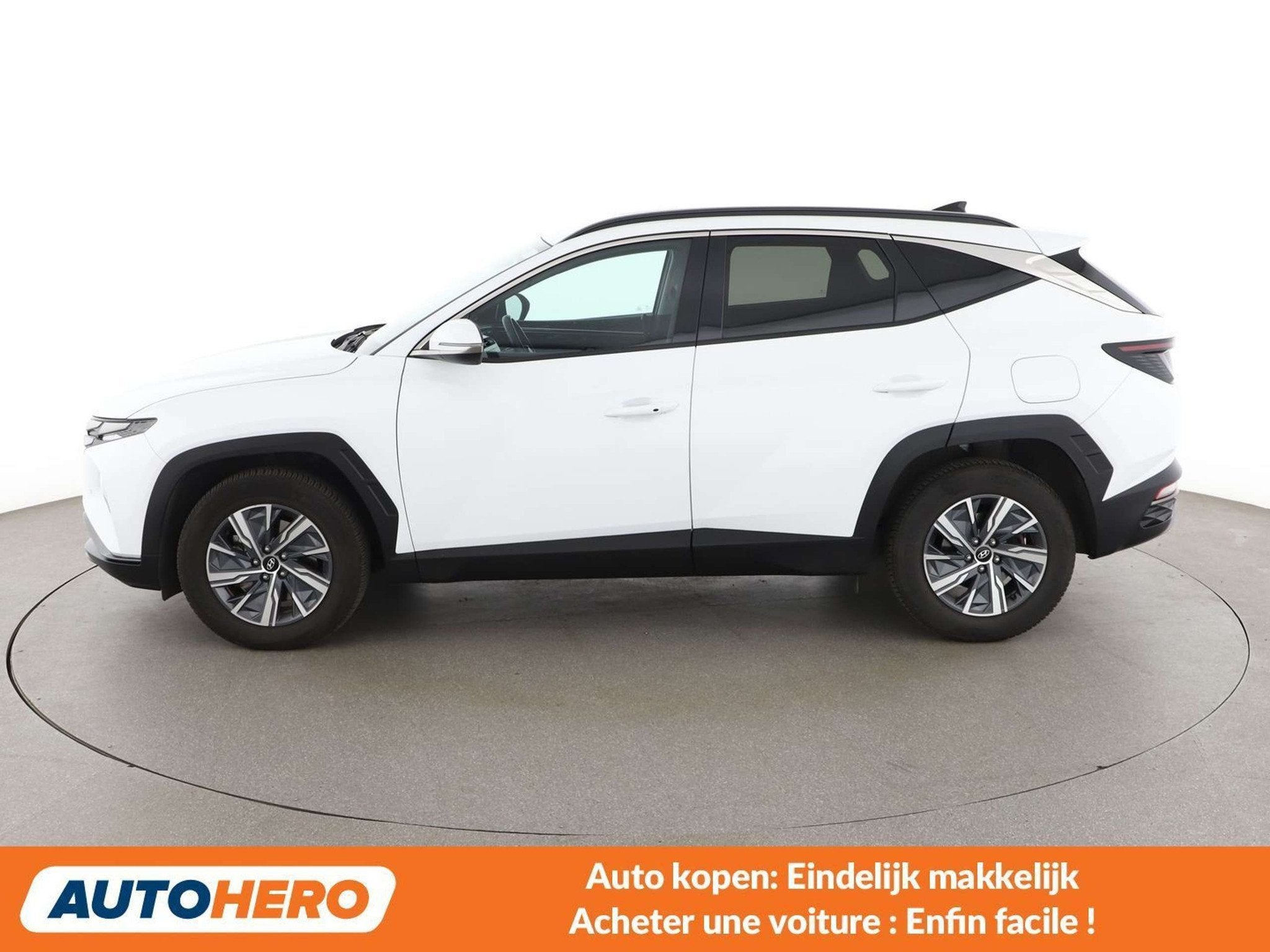 Hyundai Tucson 1.6 T-GDI Hybrid Prime 2WD (bj 2021), Auto's, Stof, Gebruikt, 169 kW, Elektrisch