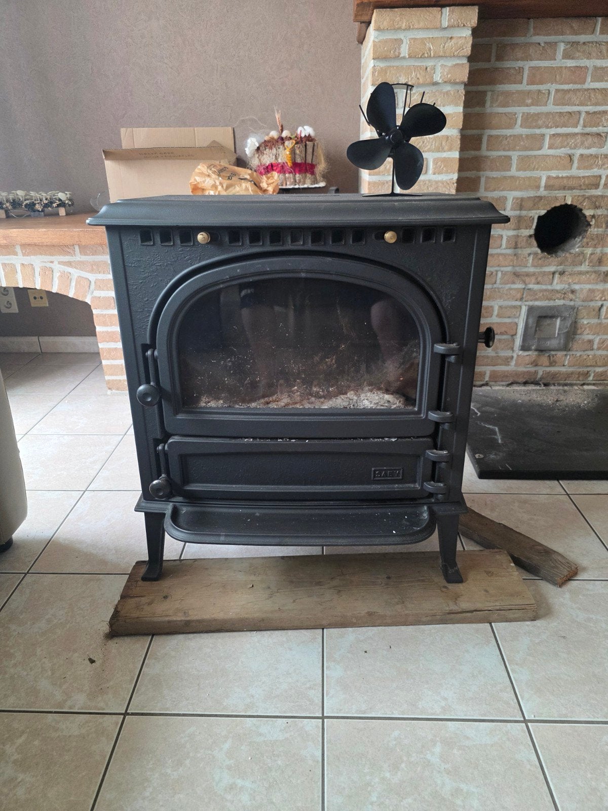 Houtkachel Saey, Enlèvement, Poêle à bois