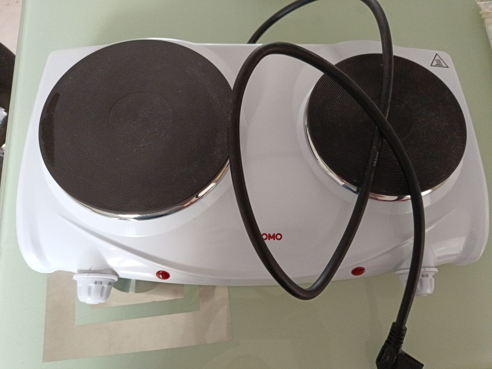 Tauqe de cuisson Domo, Enlèvement