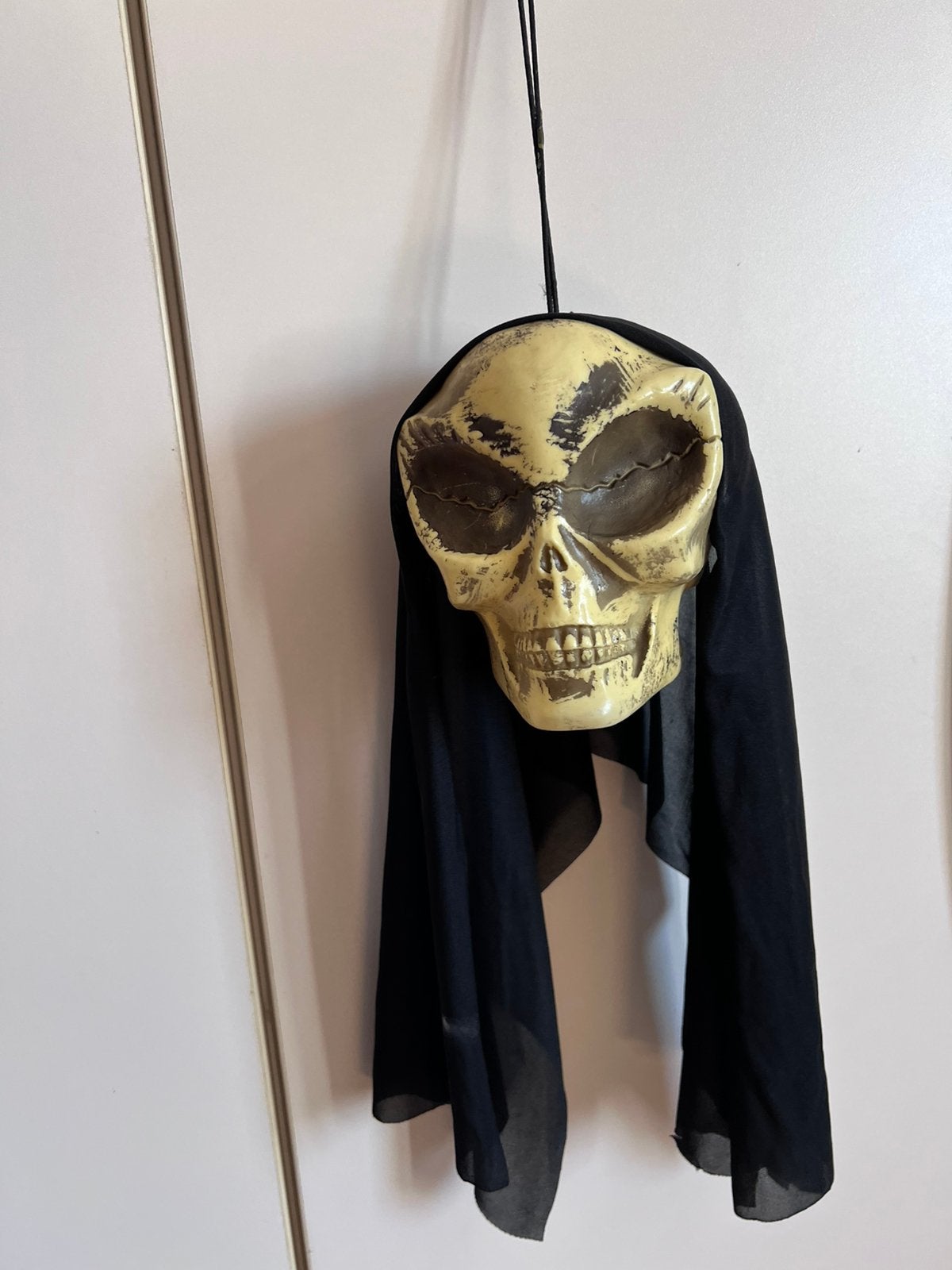 Schedel met hoofddoek, Ophalen, Gebruikt