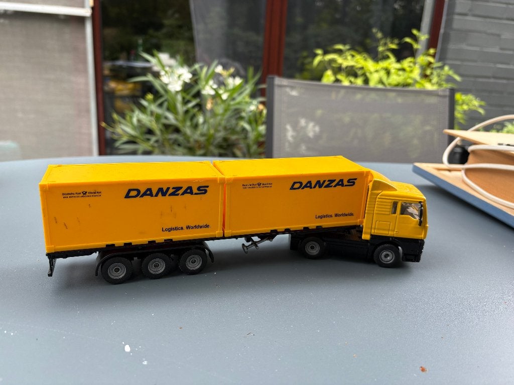 Siku 3424 - MAN TGA Container-LKW "Danzas" (Schaal 1:55), Ophalen of Verzenden, Zo goed als nieuw, Bus of Vrachtwagen, SIKU