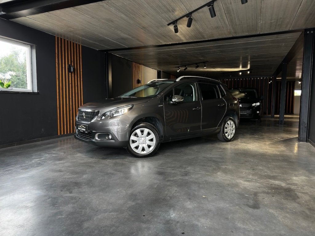 Peugeot 2008 1.2i PureTech Style| Sensoren| Carplay| BT| ..., Auto's, Voorwielaandrijving, Dealer onderhouden, Stof, 1199 cc
