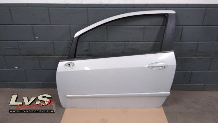 Portière 2portes gauche d'un Fiat Punto Evo (760), -, 3 mois de garantie, Utilisé, Porte
