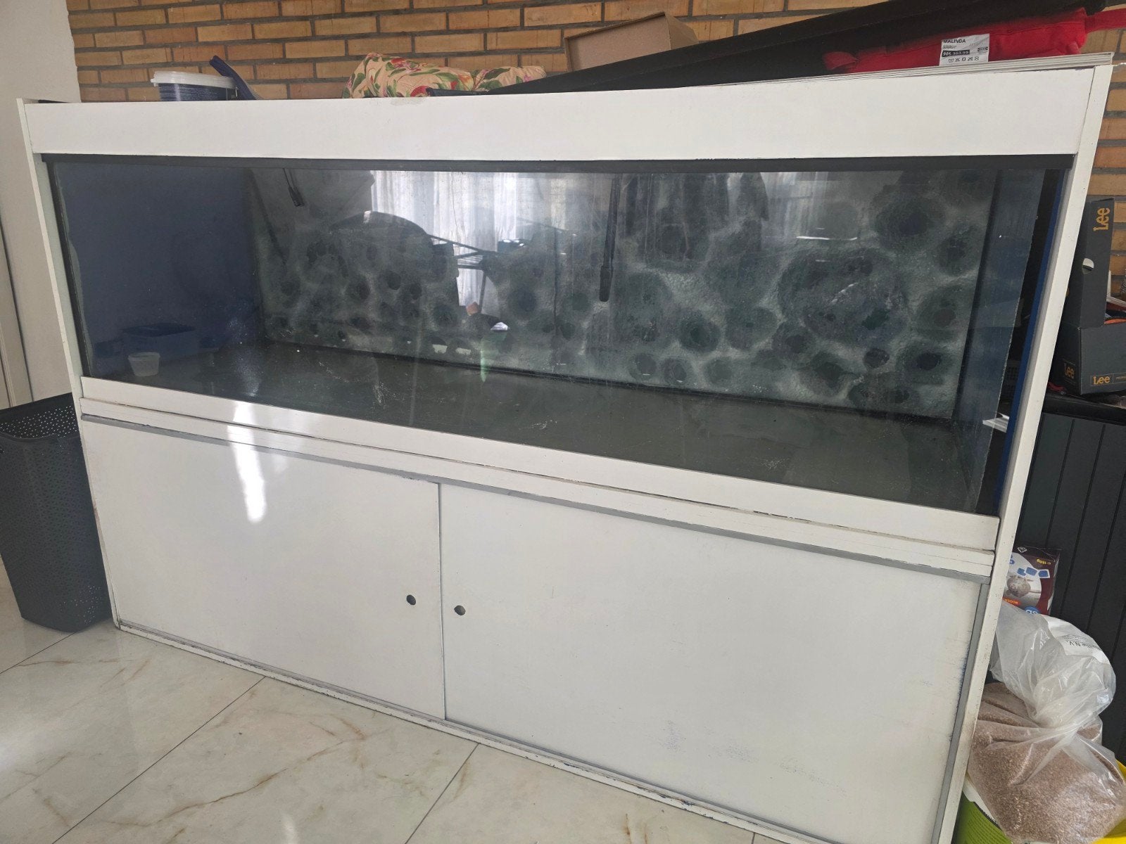aquairum te koop, Enlèvement