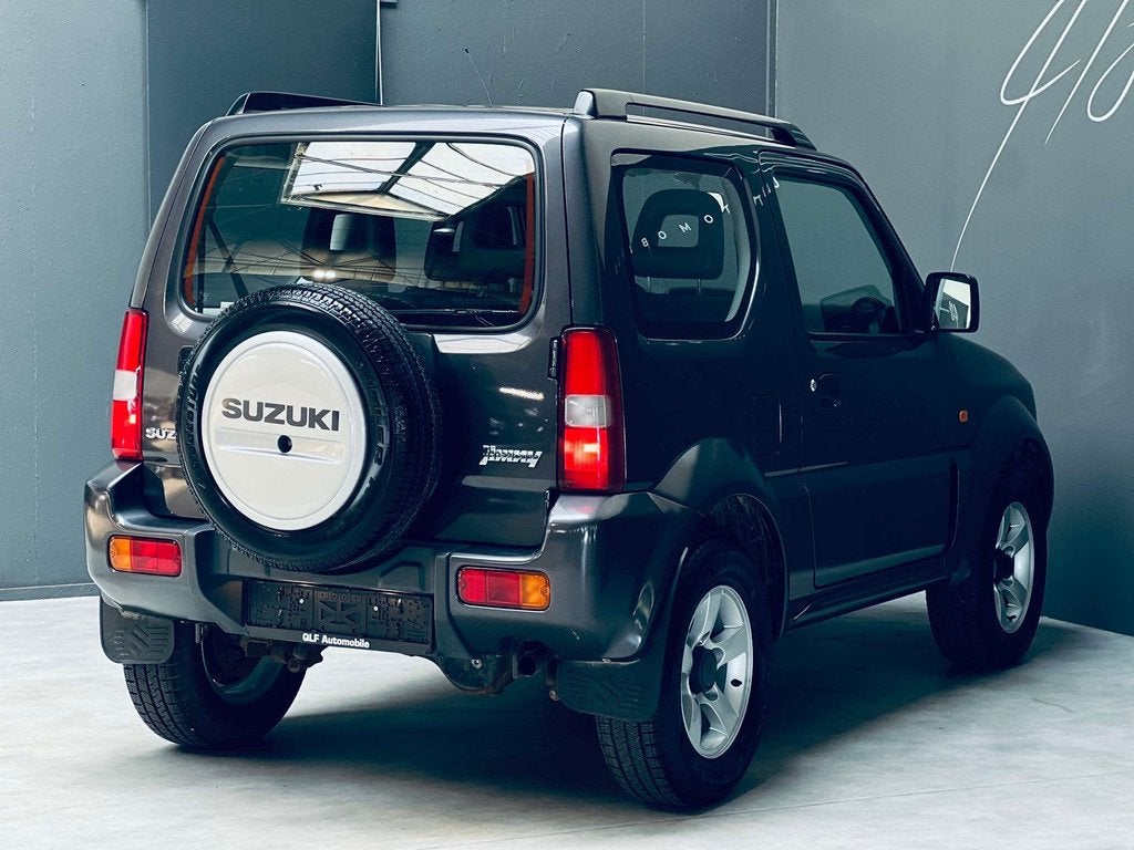 Suzuki Jimny 1.3i *AUTOMATIQUE*GPS*CLIMATISATION* (bj 2012), Auto's, Gebruikt, Bedrijf, Vierwielaandrijving, SUV of Terreinwagen