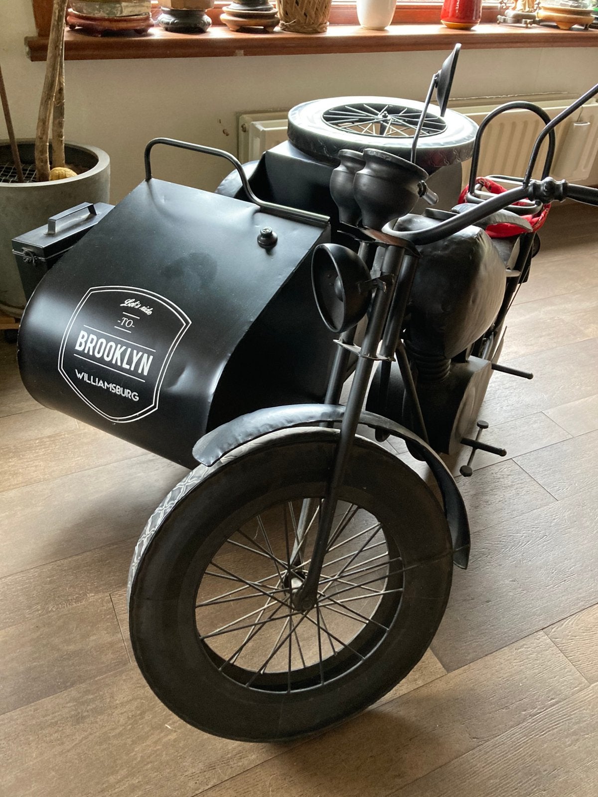 Reclame moto met zijspan, Enlèvement