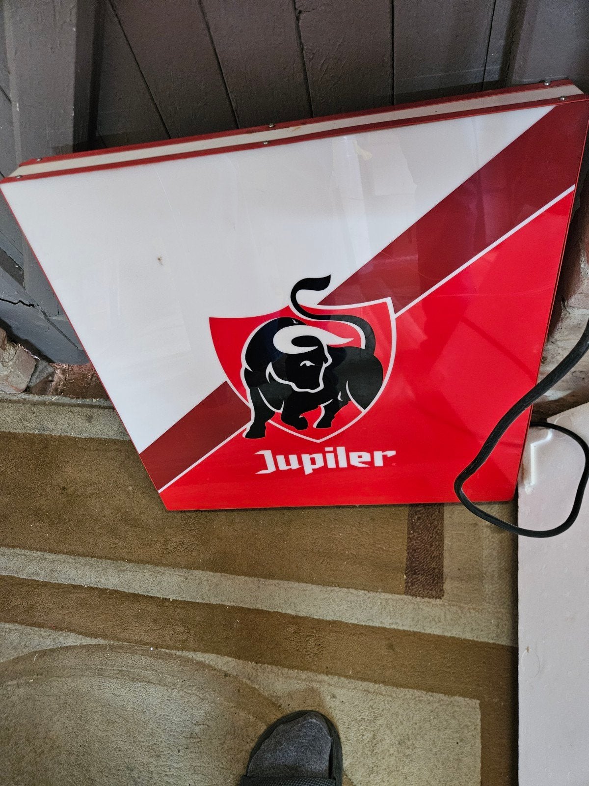 Jupiler lichtbord, Ophalen