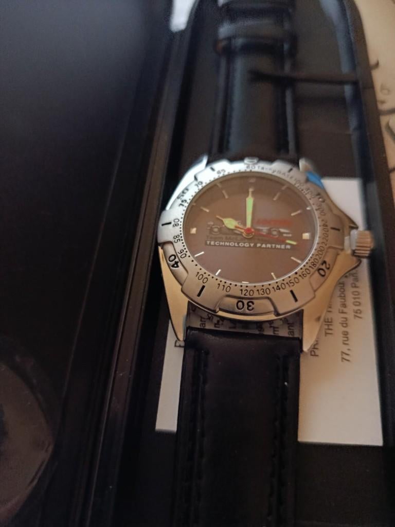 Vintage McLaren-Loctite horloge, Autres marques, Enlèvement ou Envoi, Cuir, Acier