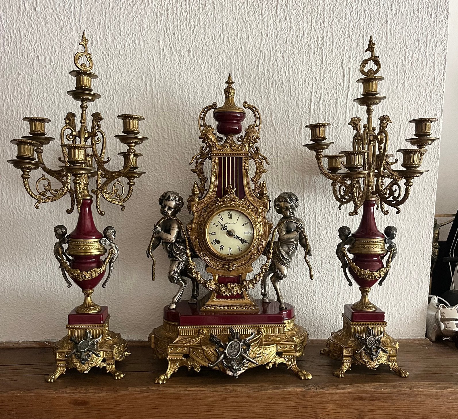 bronzen klok met kandelaars, Ophalen