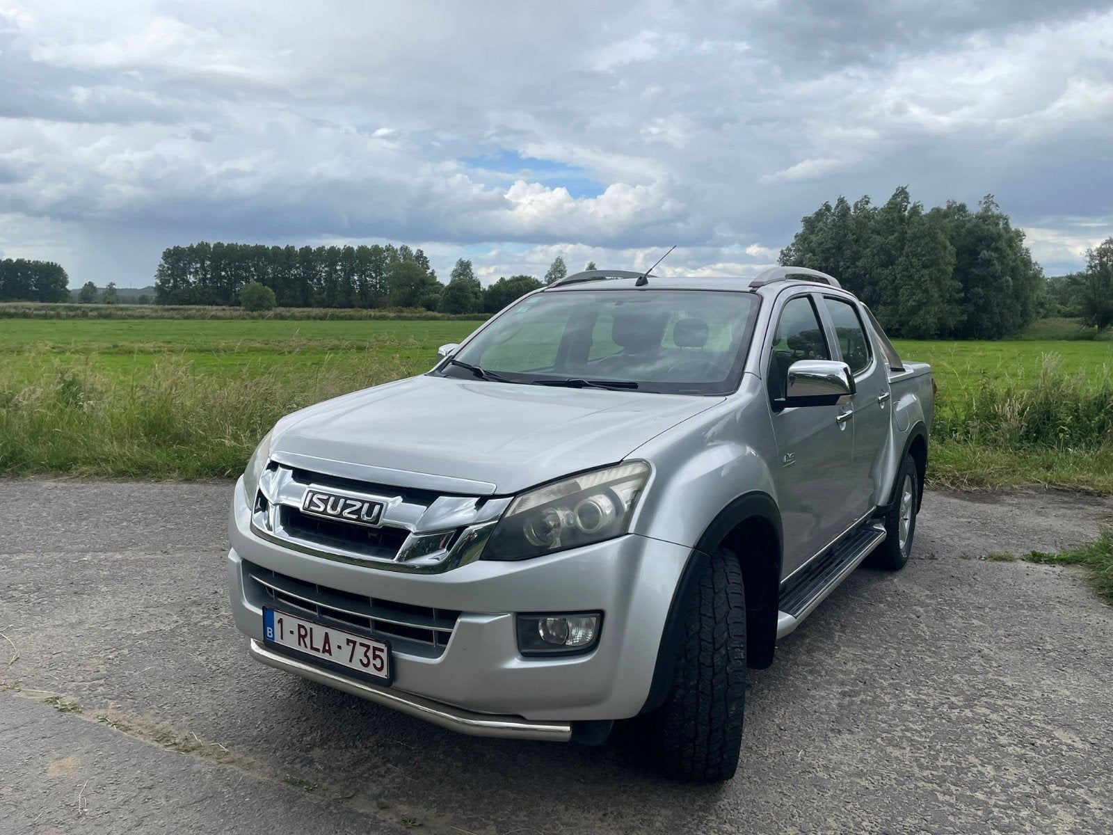Isuzu D Max 2.5TDi Automaat Trek 3500kg lichte vracht 4x4, Stof, Navigatiesysteem, Bedrijf, Grijs
