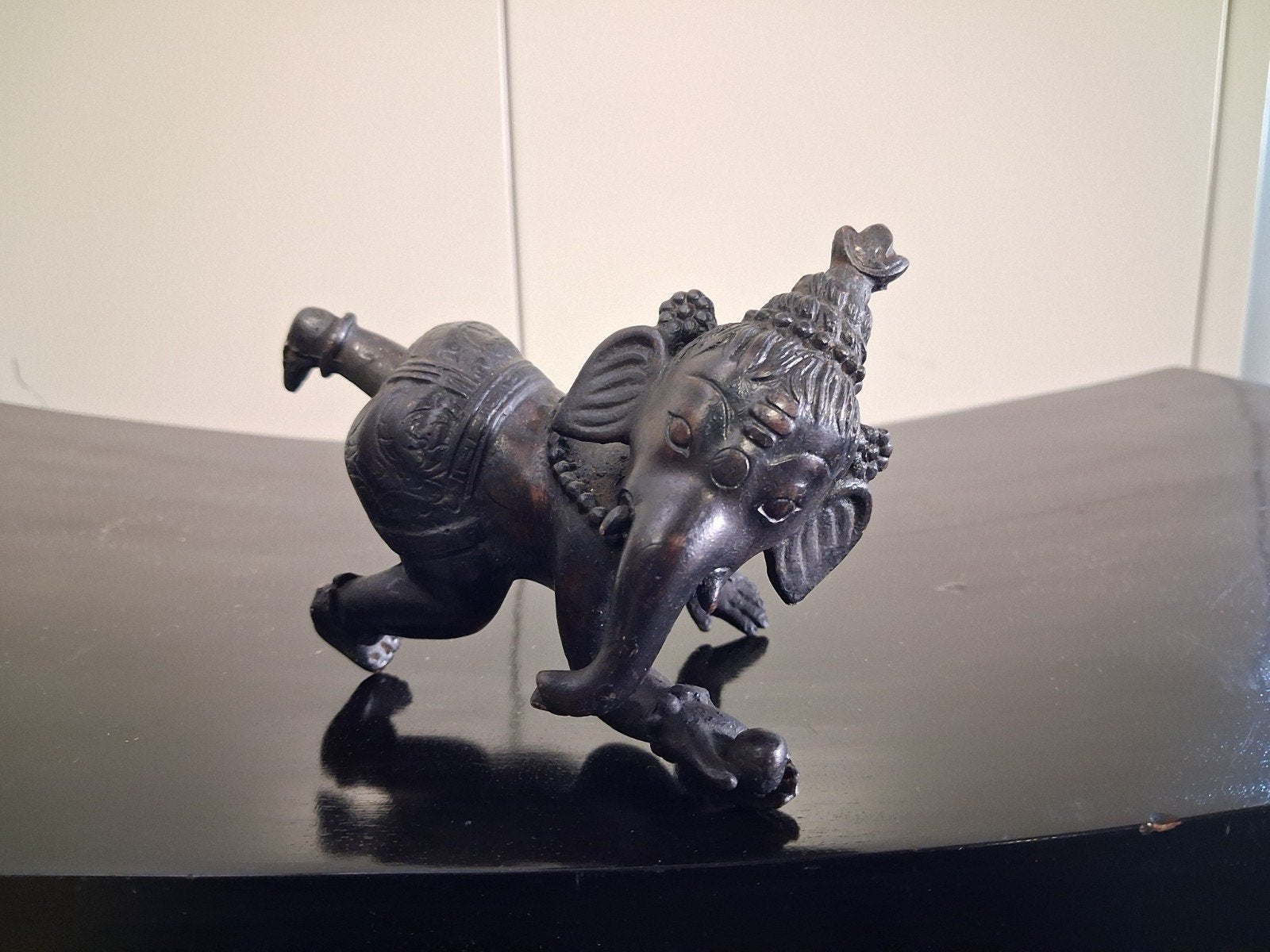 Ganesha beeldje, Ophalen