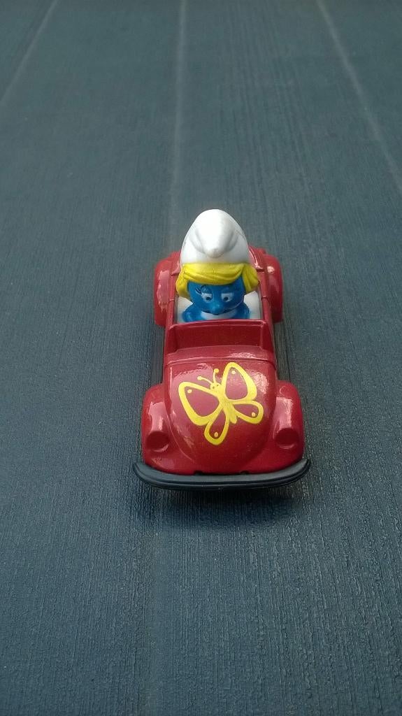 Schtroumpfette en voiture ERTL, Collections, Schtroumpfs, Utilisé, Poupée, Figurine ou Peluche, Schtroumpfette, Enlèvement ou Envoi