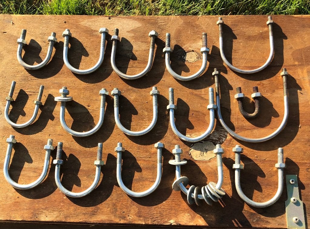 19 supports en U pour montage sur tuyaux (avec écrous), Enlèvement