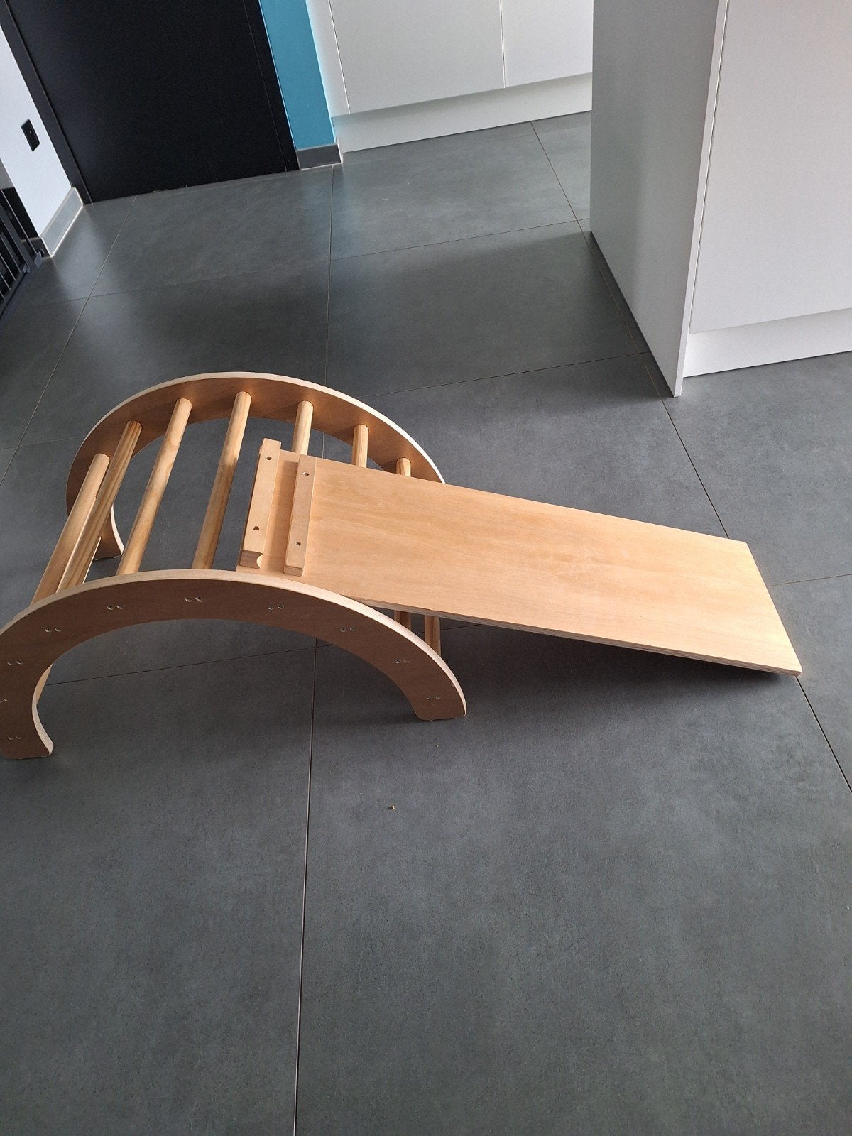 Houten klimboog met glijbaan, Ophalen