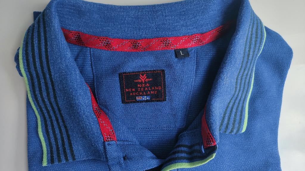 New Zealand Auckland (NZA) polo Epic Cobalt, Maat 52/54 (L), Blauw, Ophalen of Verzenden, Zo goed als nieuw
