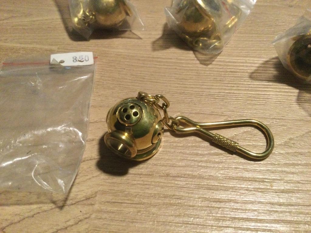 Sleutelhanger duikhelm nieuw aan 8,50€/stuk - Ecocheques, Ophalen of Verzenden, Nieuw, Overige typen