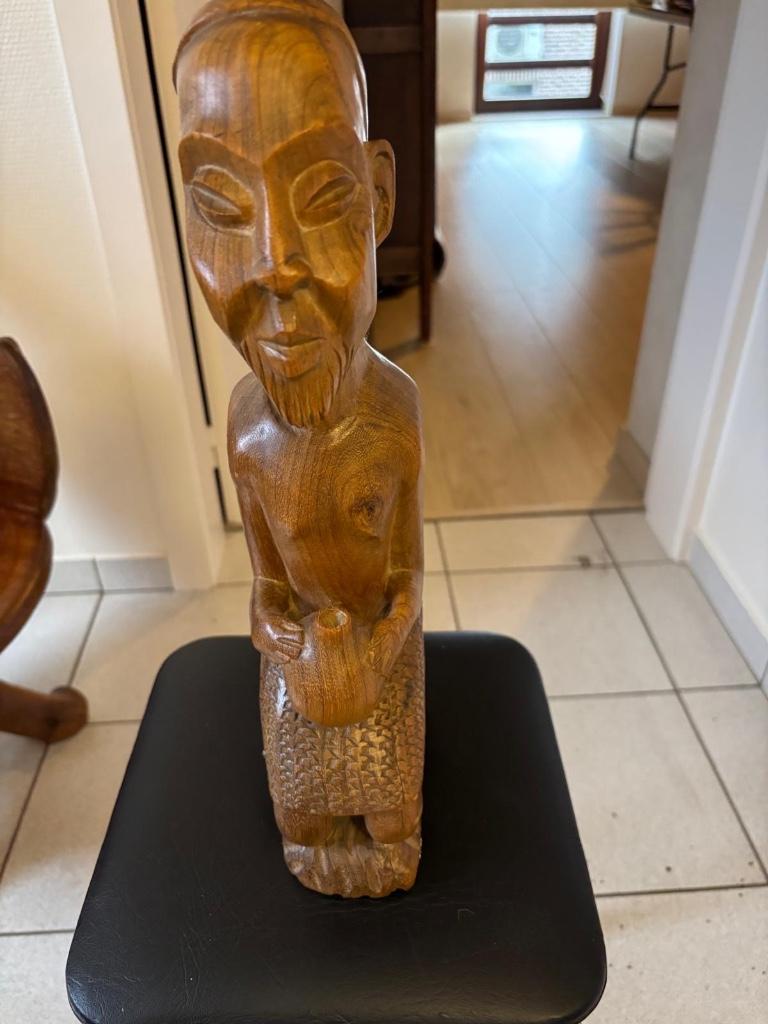 Afrikaans houten beeld, Ophalen