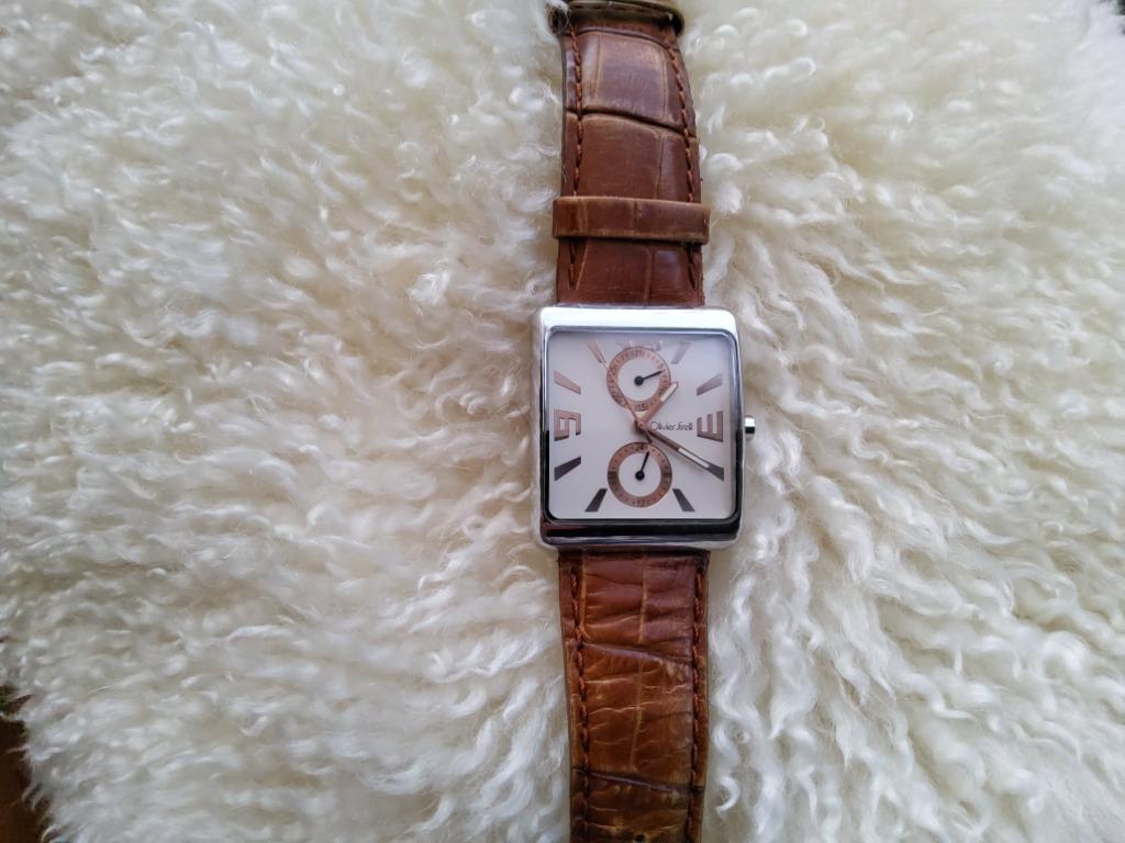 regarder Olivier Strelli, Bijoux, Sacs & Beauté, Montre-bracelet, Autres marques, Enlèvement ou Envoi, Cuir