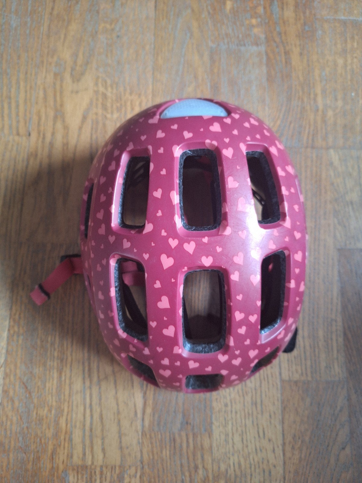 Casque rose pour enfant., Enlèvement