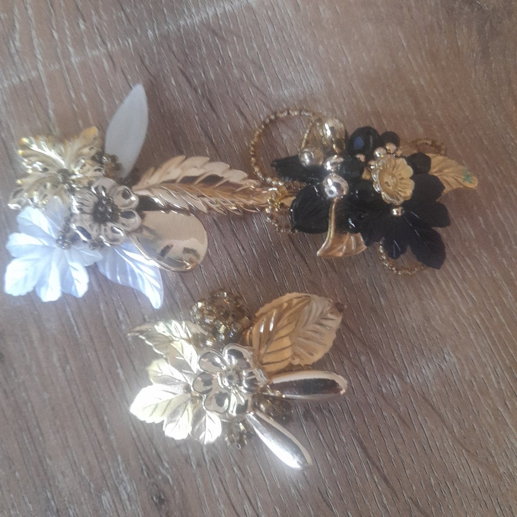 Broches en kettingen, Ophalen, Zo goed als nieuw