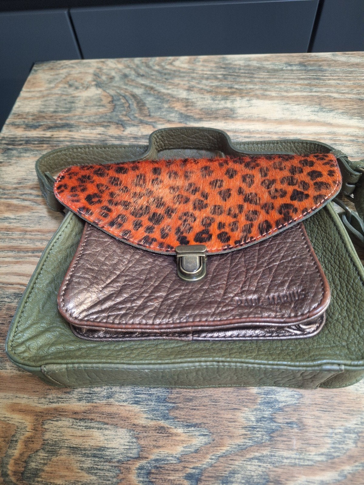 sac bandoulière Paul Marius, Ophalen
