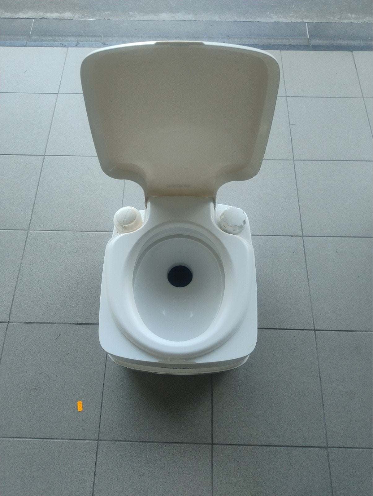 draagbare toilet, Ophalen