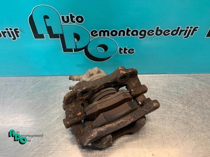 Etrier de frein (pince) avant gauche d'un Citroen C3 (C3 02-, -, 3 mois de garantie, Utilisé, -