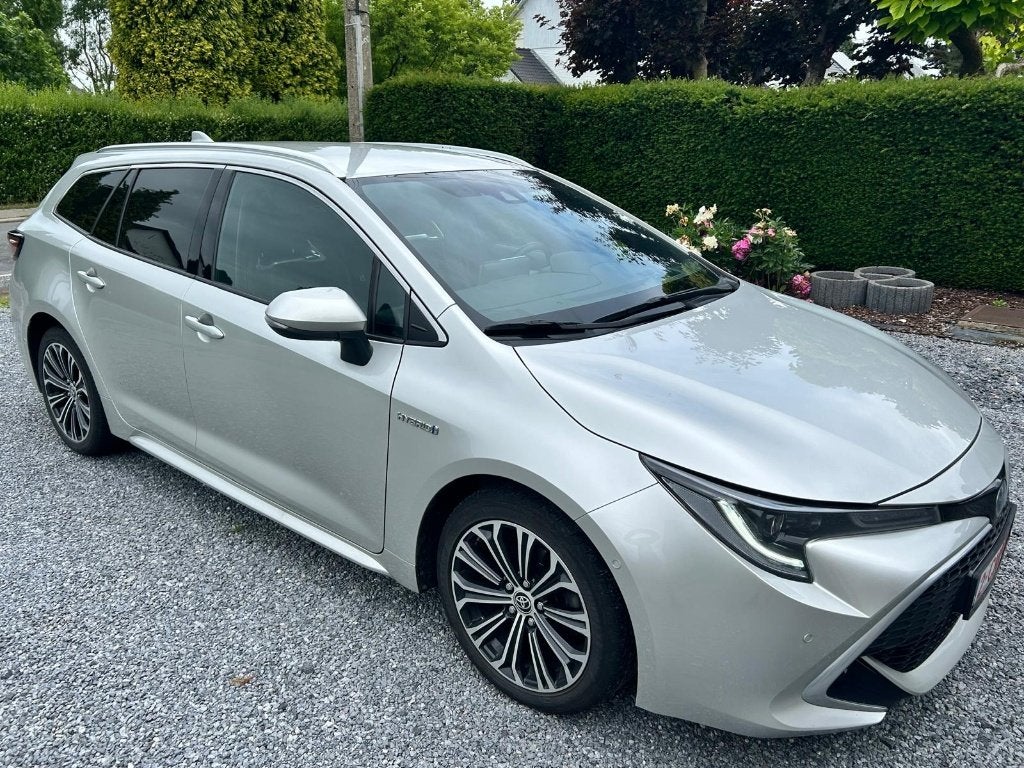 Toyota Corolla SW Hybrid 1.8 Premium e-CVT, Auto's, 72 kW, Corolla, Leder, 5 deurs
