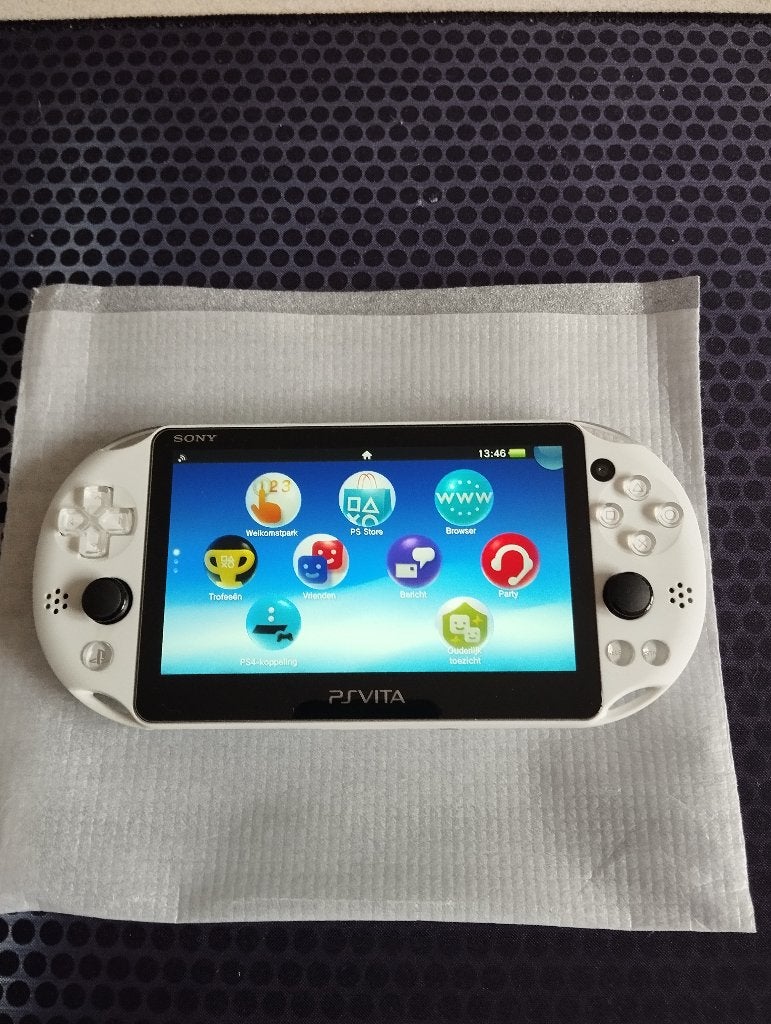 Sony PS Vita slim, Games en Spelcomputers, Spelcomputers | Sony PlayStation Vita, Zo goed als nieuw, Wit, Ophalen of Verzenden