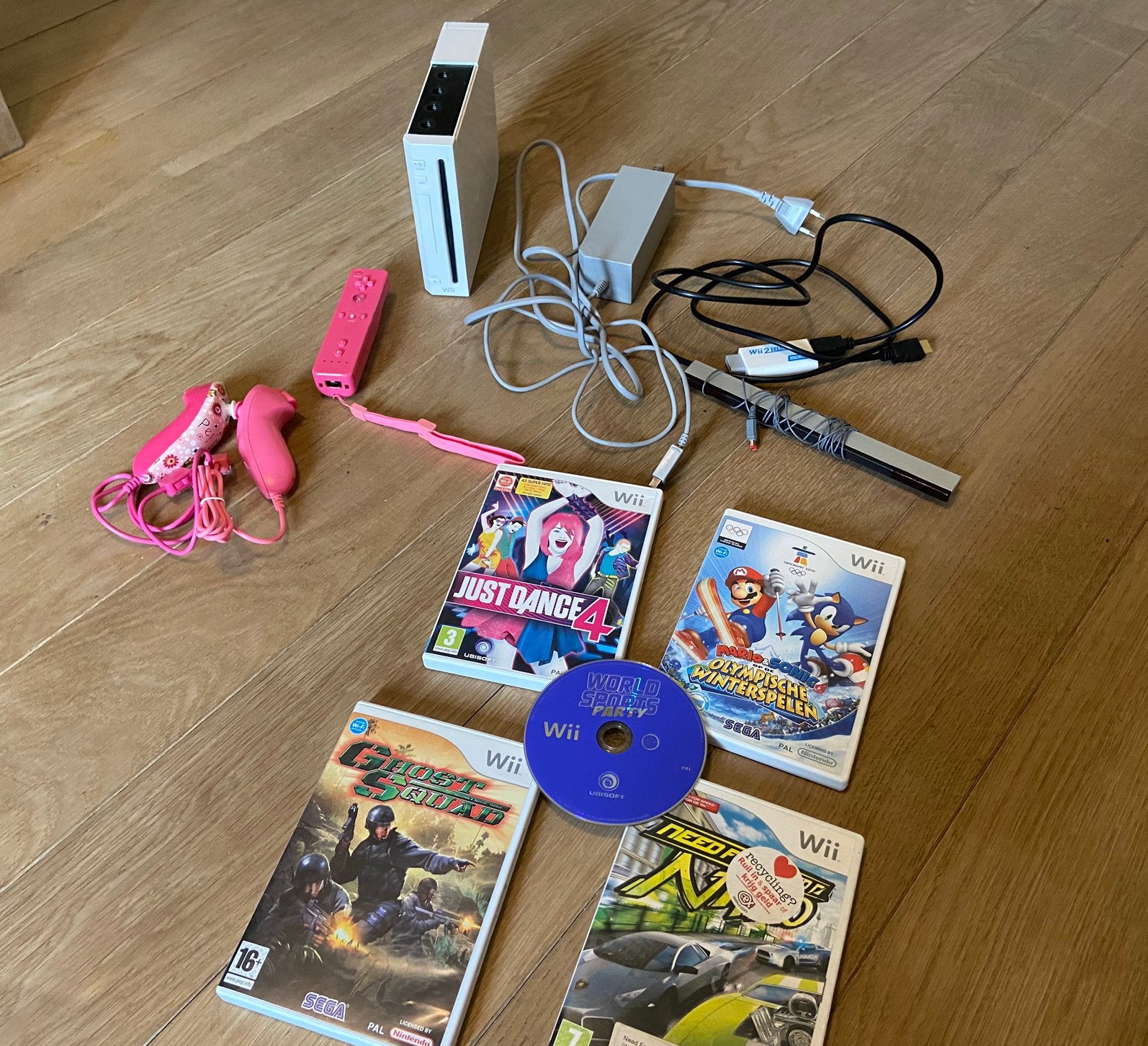 Nintendo Wii + 5 spellen + toebehoren, Ophalen of Verzenden, Zo goed als nieuw