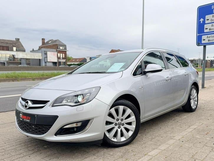 Opel Astra Sports Tourer 2016 125dkm 1.4i Euro6b Xenon Leder, Autos, Opel, Cuir, Argent ou Gris, Euro 6, Entreprise