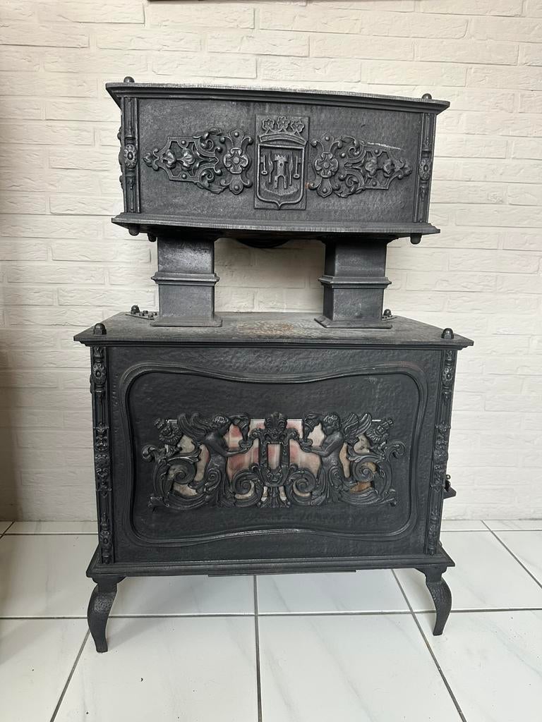 Antieke gietijzeren etagekachel hout Al. Claeys Zedelgem, Enlèvement, Comme neuf, Bois